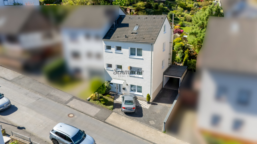 Außenansicht - Sehr gepflegte, ruhig gelegene DHH mit Garage, Garten, Kamin und viel Platz für die ganze Familie
