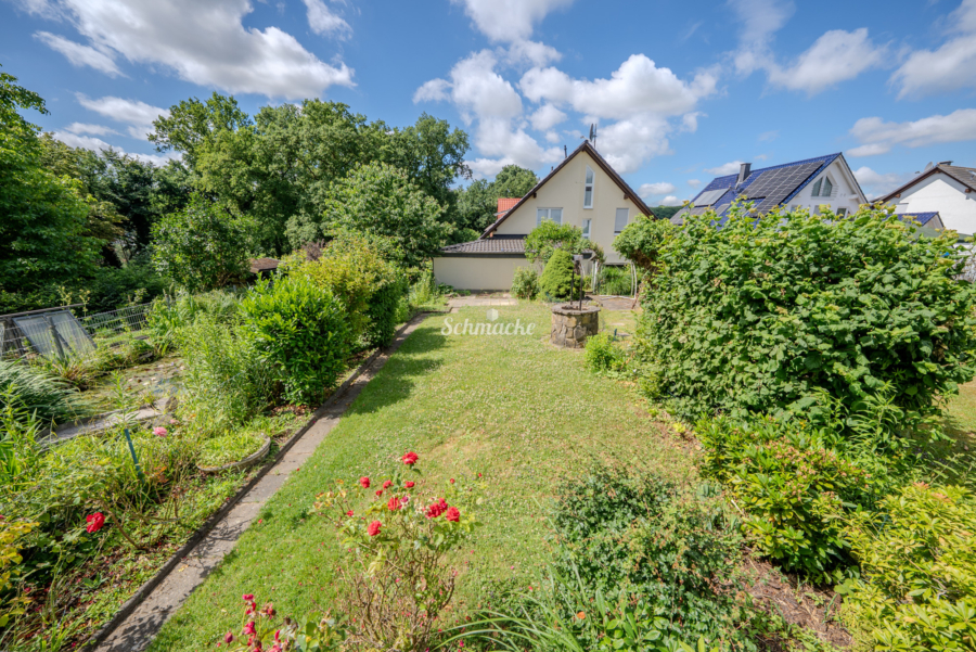 Garten - Großzügiges Reihenmittelhaus mit Garage, Stellplatz und schönem Garten